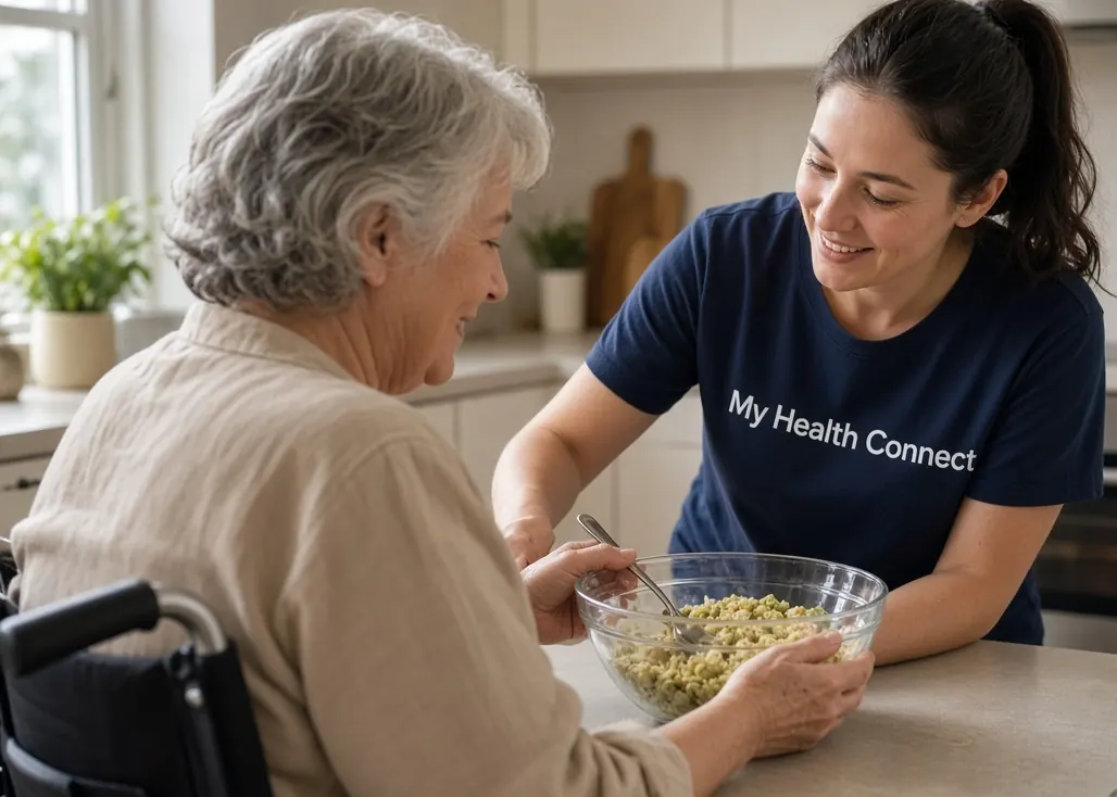 A My Health Connect support worker and a participant preparing a meal together at a kitchen bench.
